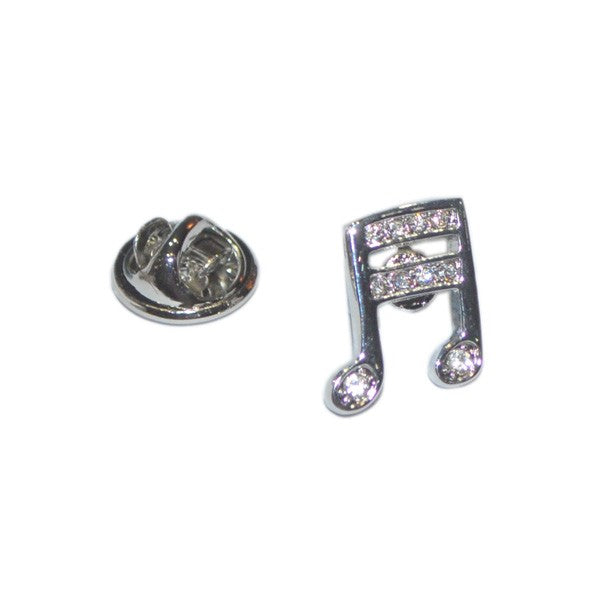 Silver music note earrings with clear gemstones on a white background