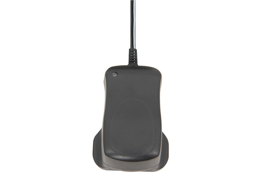 back view of the power adaptor with a led light and the wire on a white background