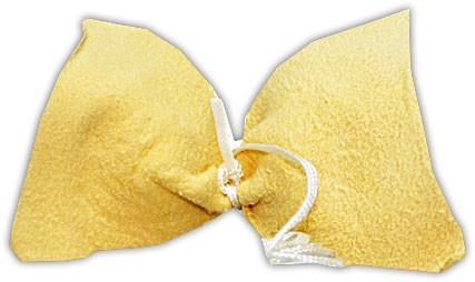 This yellow pull through is made of absorbent fabric attached to a cord to pull it through the instruments.