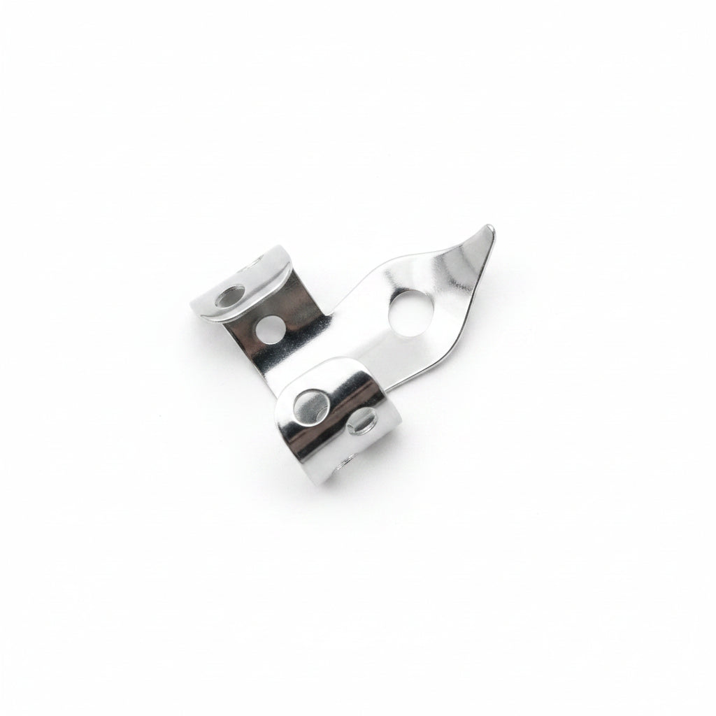 below view of a nickel finger pick on a white background