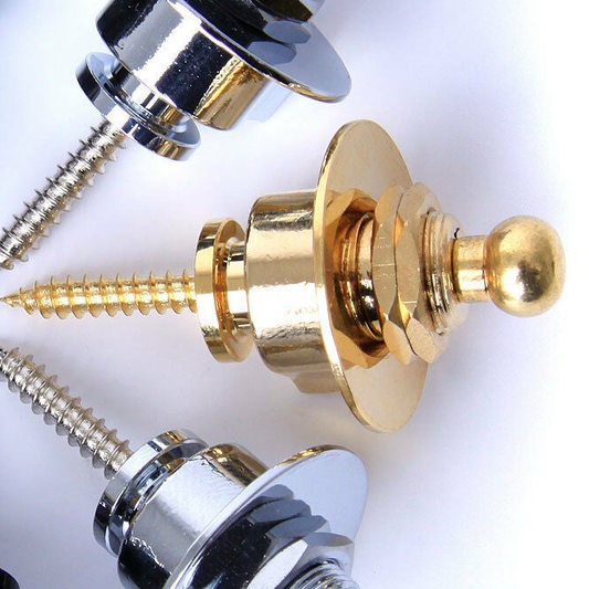 Gold guitar strap lock on a white background