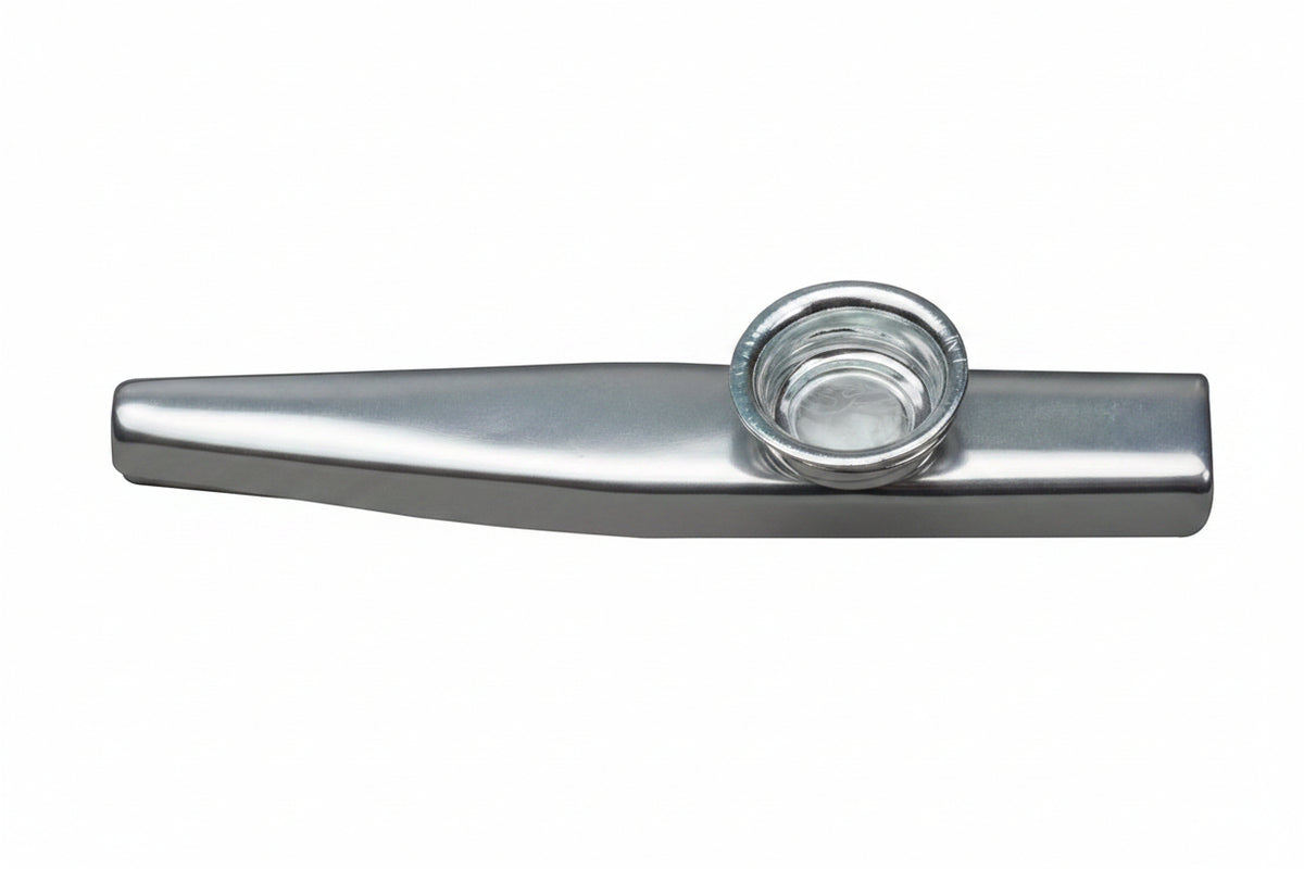 Metallic kazoo on a white background