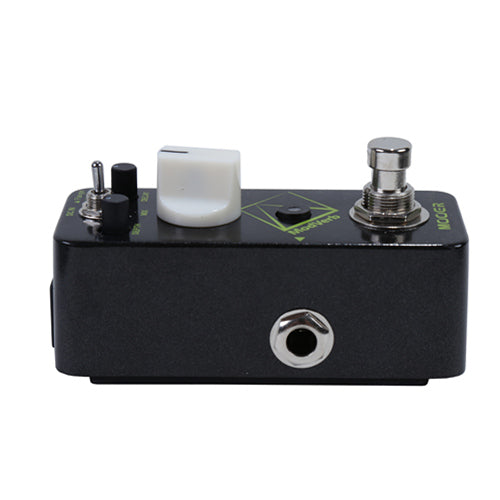 Black guitar effects pedal with various controls on a white background
