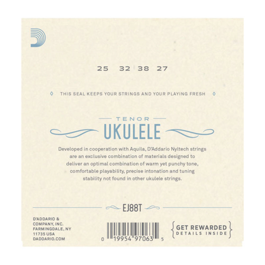 D'Addario ukulele string set packaging with product details on a beige background