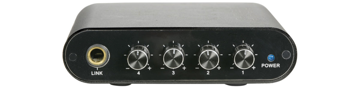 front view of headphones amplifier with multiple knobs and a power indicator on a white background