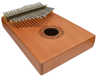 Wooden kalimba with metal tines on a white background