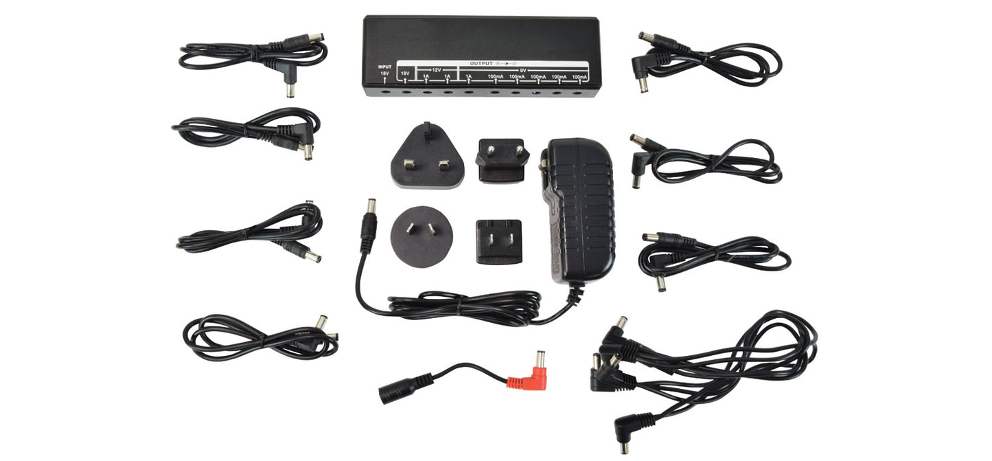 Collection of various power adapters and cables on a white background