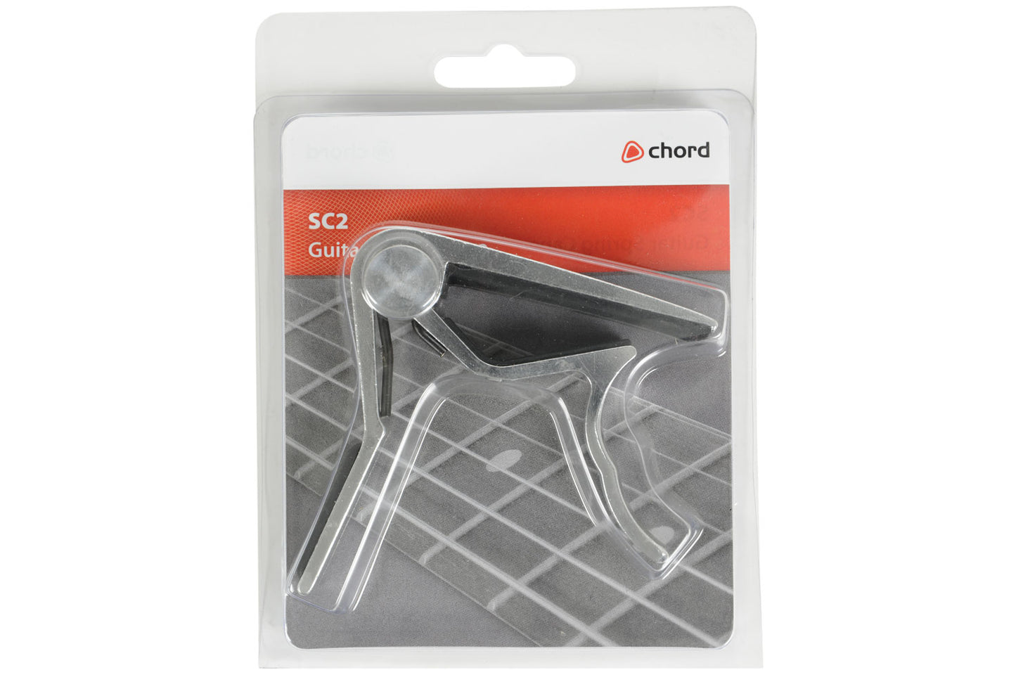 Guitar capo in packaging with Chord brand label on a white background