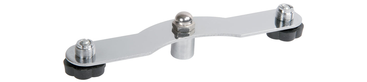 Metallic T like shaped object, with one bolt to attach to the microphone stand and two more bolts on the other end where to attach two microphones.
