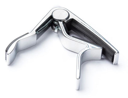 Chrome and black rubber guitar capo on a white background