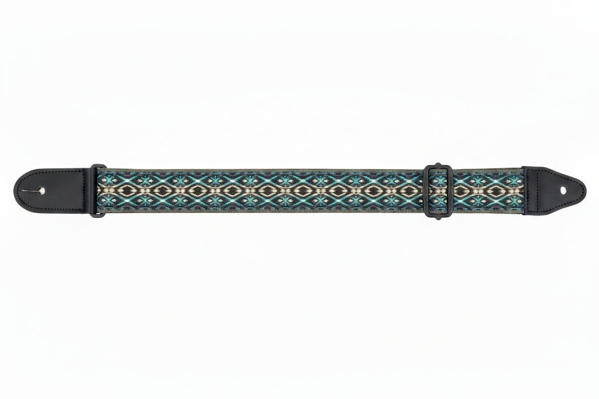 Guitar strap with colourful geometric pattern on a white background