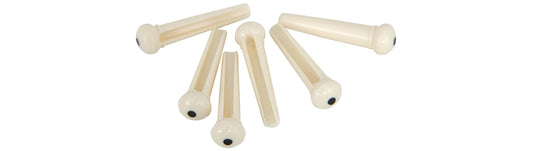 Set of acoustic guitar bridge pins on a white background