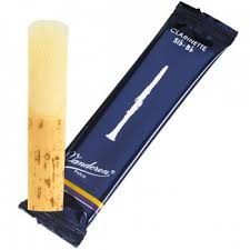 Clarinet reed with packaging on a white background