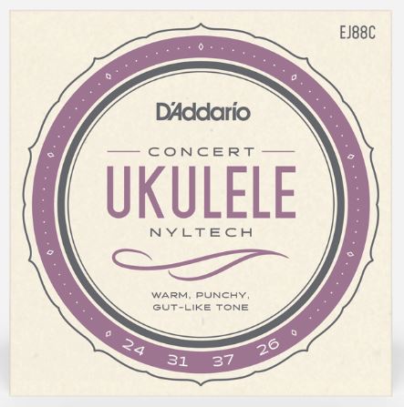 D'Addario concert ukulele string set packaging with purple and black design on a beige background