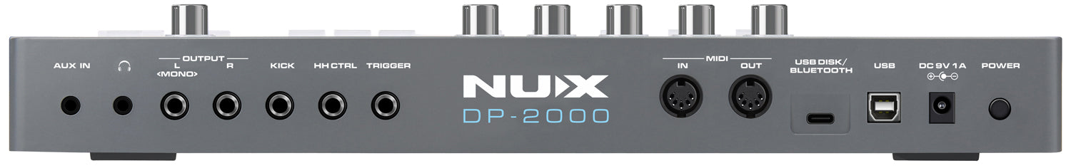 Back view of a NUX DP-2000 audio device with various ports and labels.