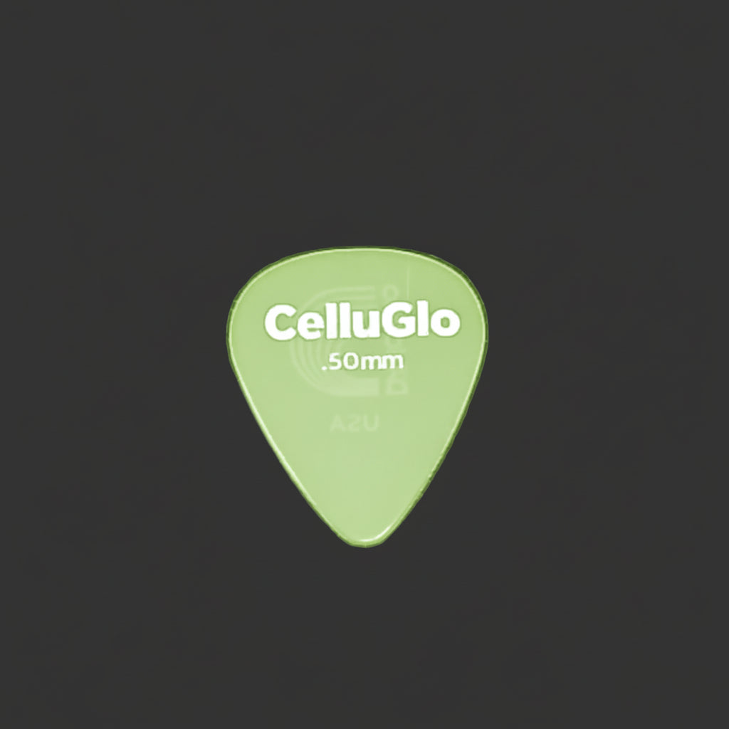 A single translucent CelluGlo .50mm guitar pick with silver branding, centered on a textured dark grey background.