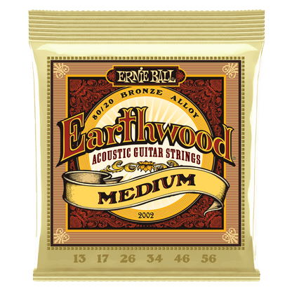 Ernie Ball Earthwood acoustic guitar strings packaging on a black background