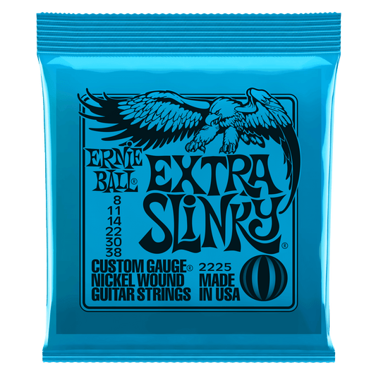 Ernie Ball Extra Slinky guitar strings packaging with blue background