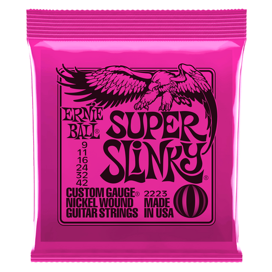 Pink packaging of Ernie Ball Super Slinky guitar strings with an eagle logo.