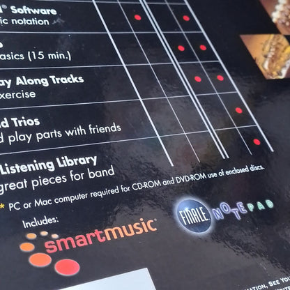 Close-up of a music theory book with smartmusic and Finale Notepad branding.