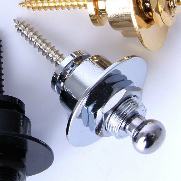 Close-up of a chrome guitar strap lock with a white background
