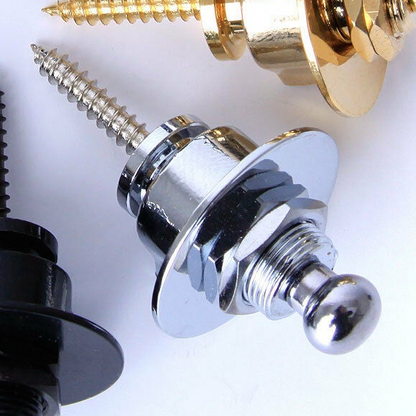 Close-up of a chrome guitar strap lock with a white background