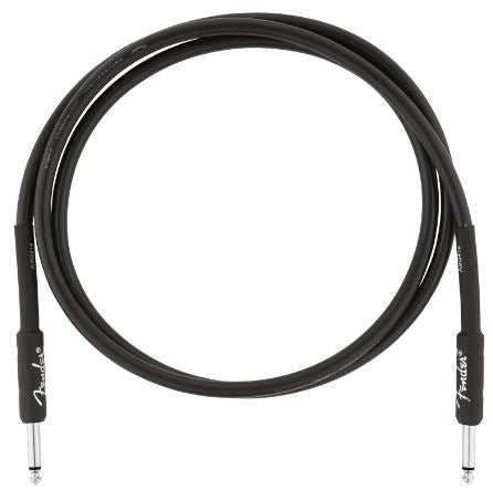Black guitar cable coiled on a white background