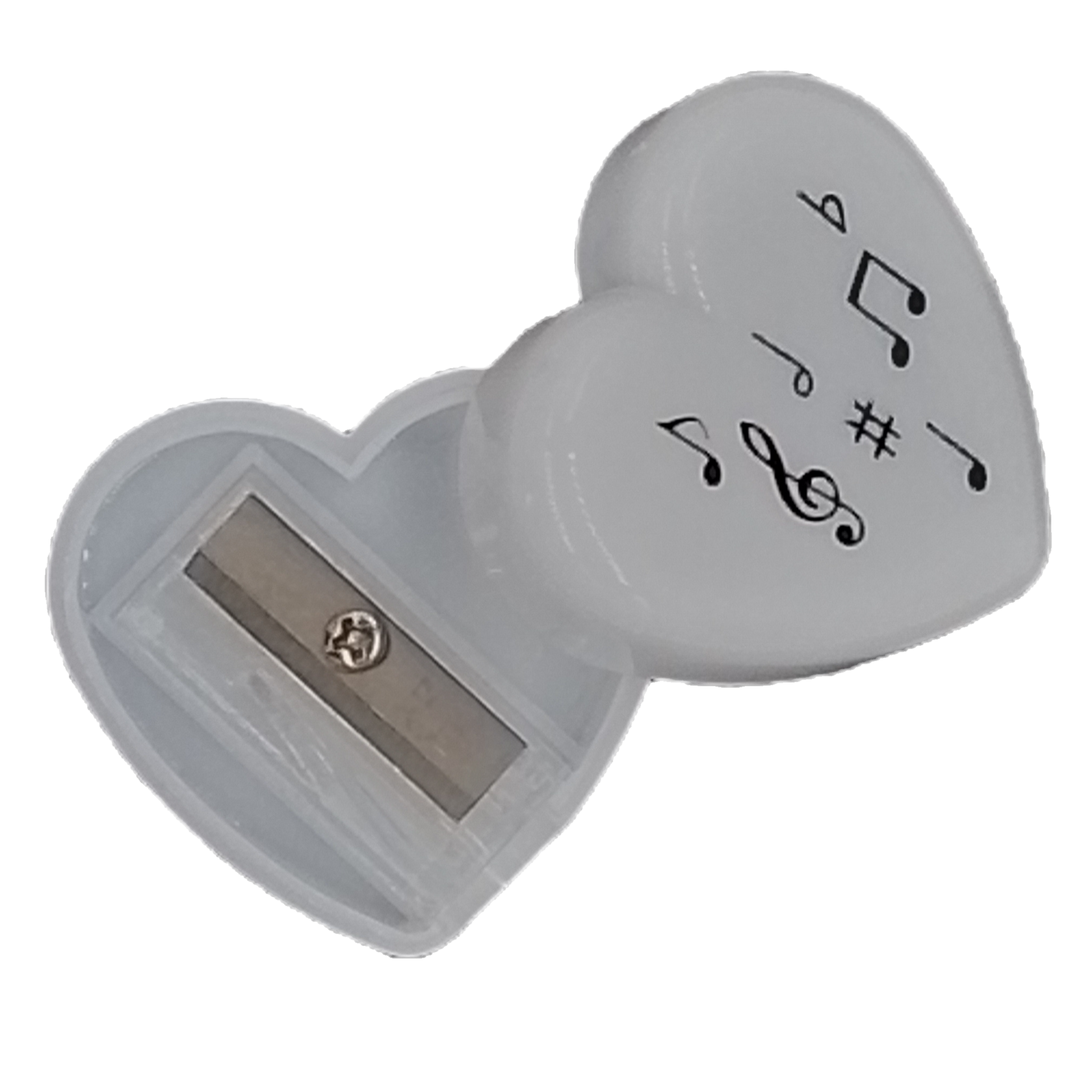 Heart-shaped sharpener with musical symbol designs on a white background