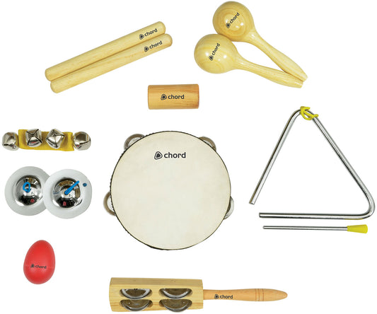 Collection of percussion instruments including a tambourine, maracas, and other small instruments on a white background.