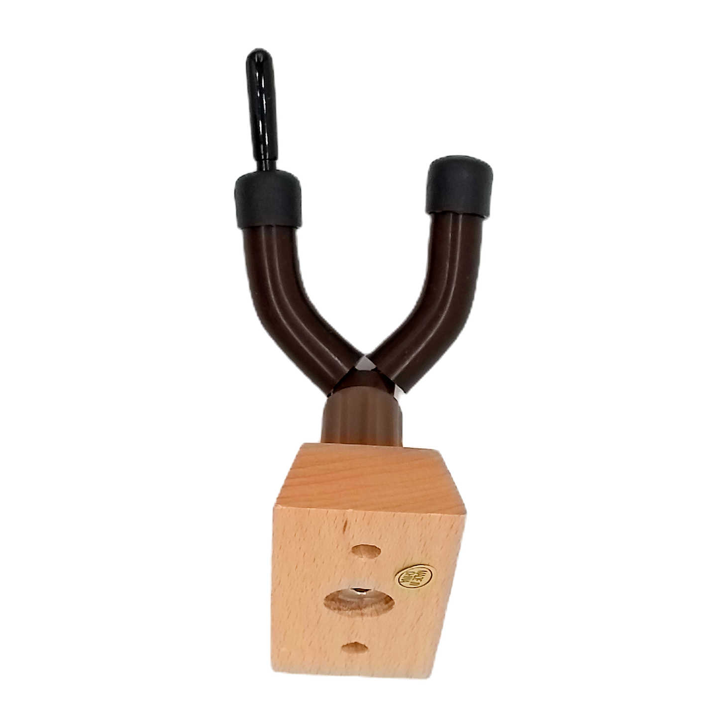 a slant view that shows the screw that attaches the metallic part of the stand to the wooden block that attaches to the wall
