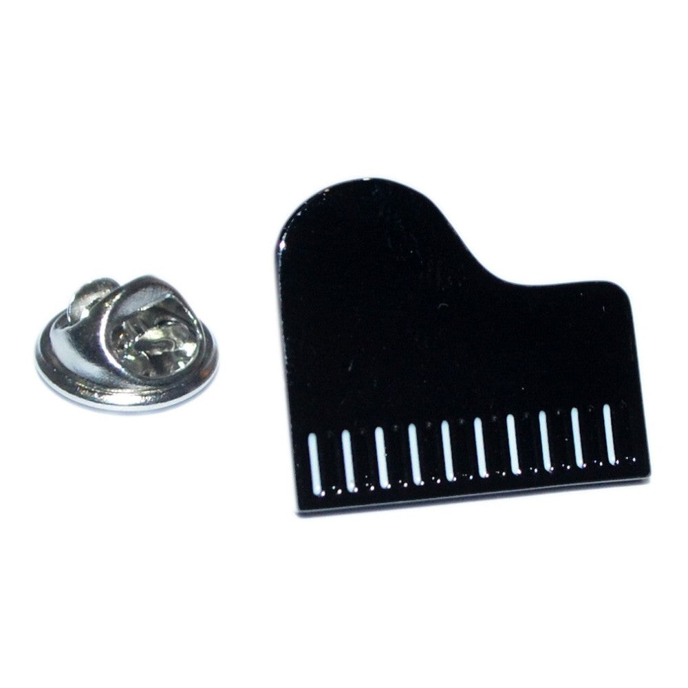 Black piano-shaped lapel pin on a white background