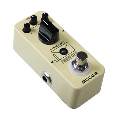 Guitar effects pedal with various knobs and labels on a beige background