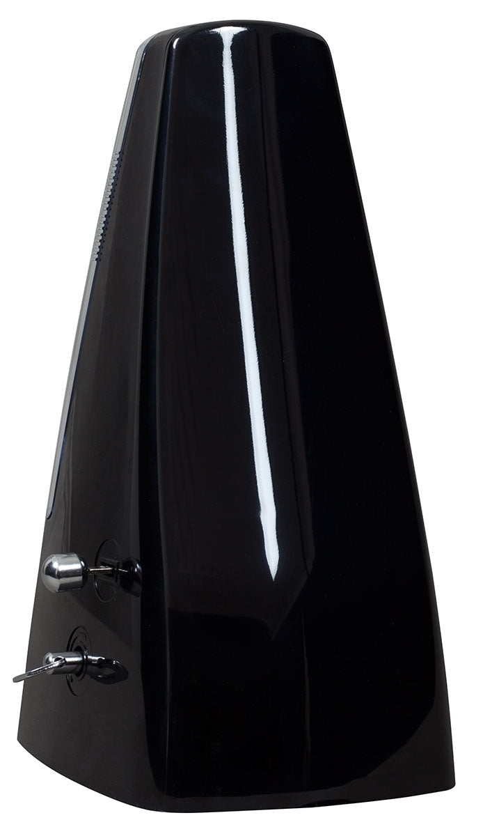 Black plastic metronome on a white background