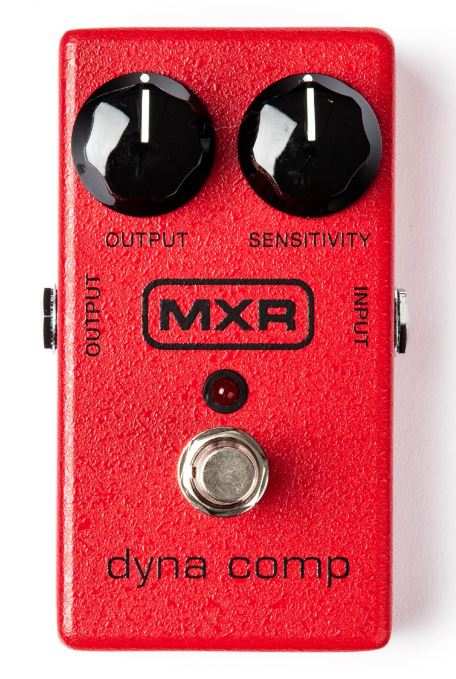 Red MXR dyna comp guitar effects pedal on a white background