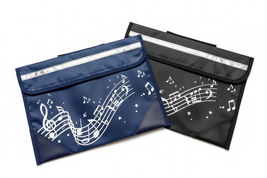 Two music bags with a music-themed musical note and staff pattern, shown on a white background. One bag is navy blue and the other is black, both featuring a silver reflective strip along the top edge.