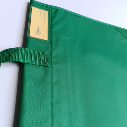 Close-up of a green fabric bag or case with a green webbing strap and a clear plastic label pocket containing a blue logo.
