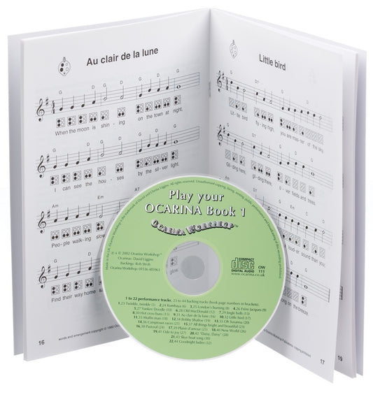 Ocarina instruction book with music notes and a CD inside