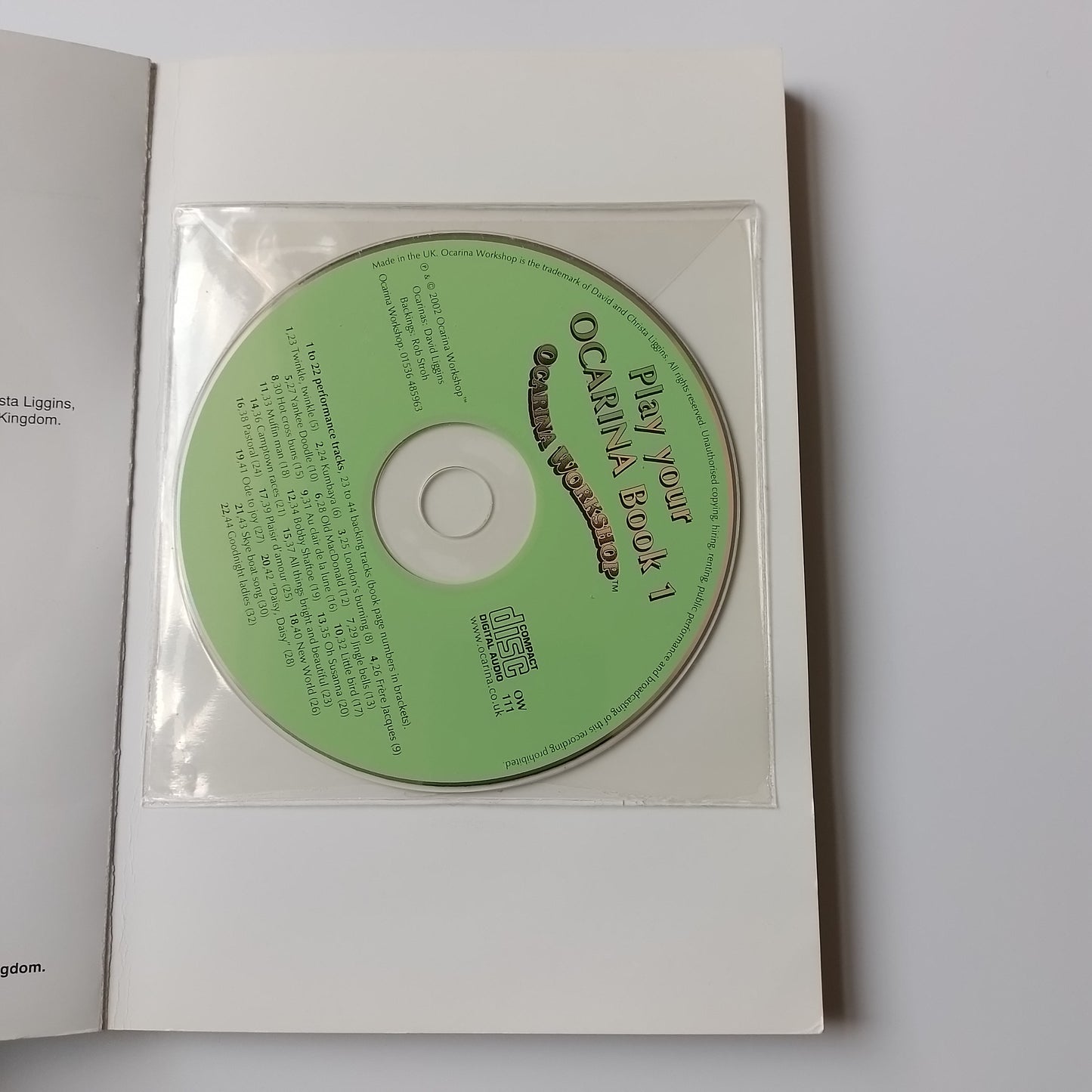 A CD disc for 'Play your Ocarina Book 1' by Daedalic, displayed inside a transparent plastic sleeve on a white background.