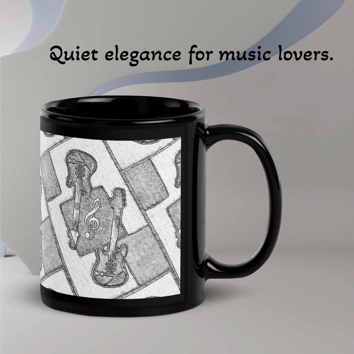 A Black mug with a geometric black-and-white design: a treble clef and guitars/bass guitars (one on each side), playing with light and shadow — quiet elegance for music lovers.