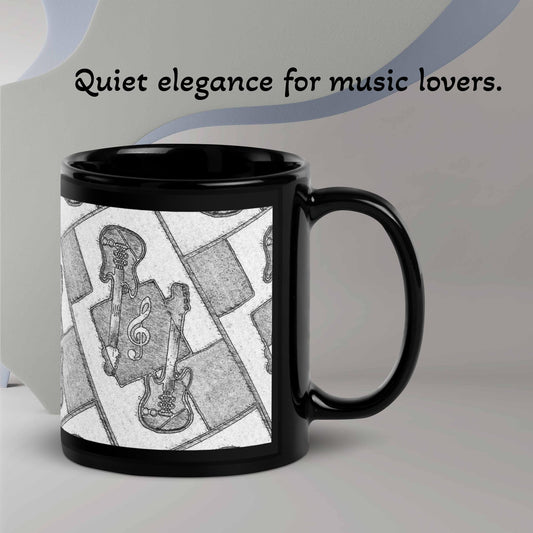 A Black mug with a geometric black-and-white design: a treble clef and guitars/bass guitars (one on each side), playing with light and shadow — quiet elegance for music lovers.