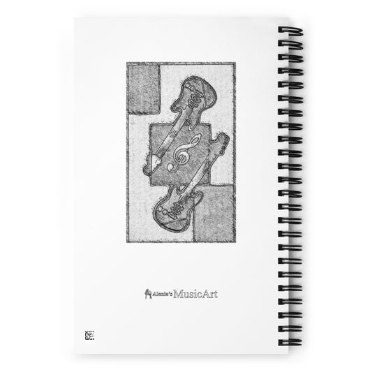 Spiral-bound notebook with a black and white illustration of a guitar and treble clef on the cover.