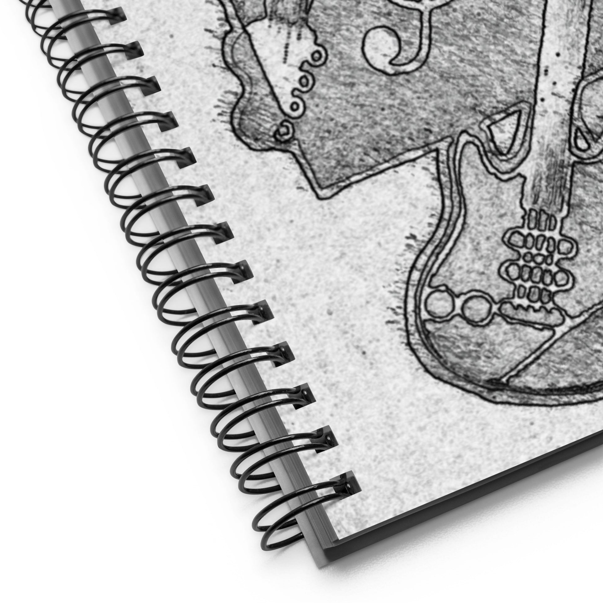 Spiral-bound notebook with a guitar illustration on the cover