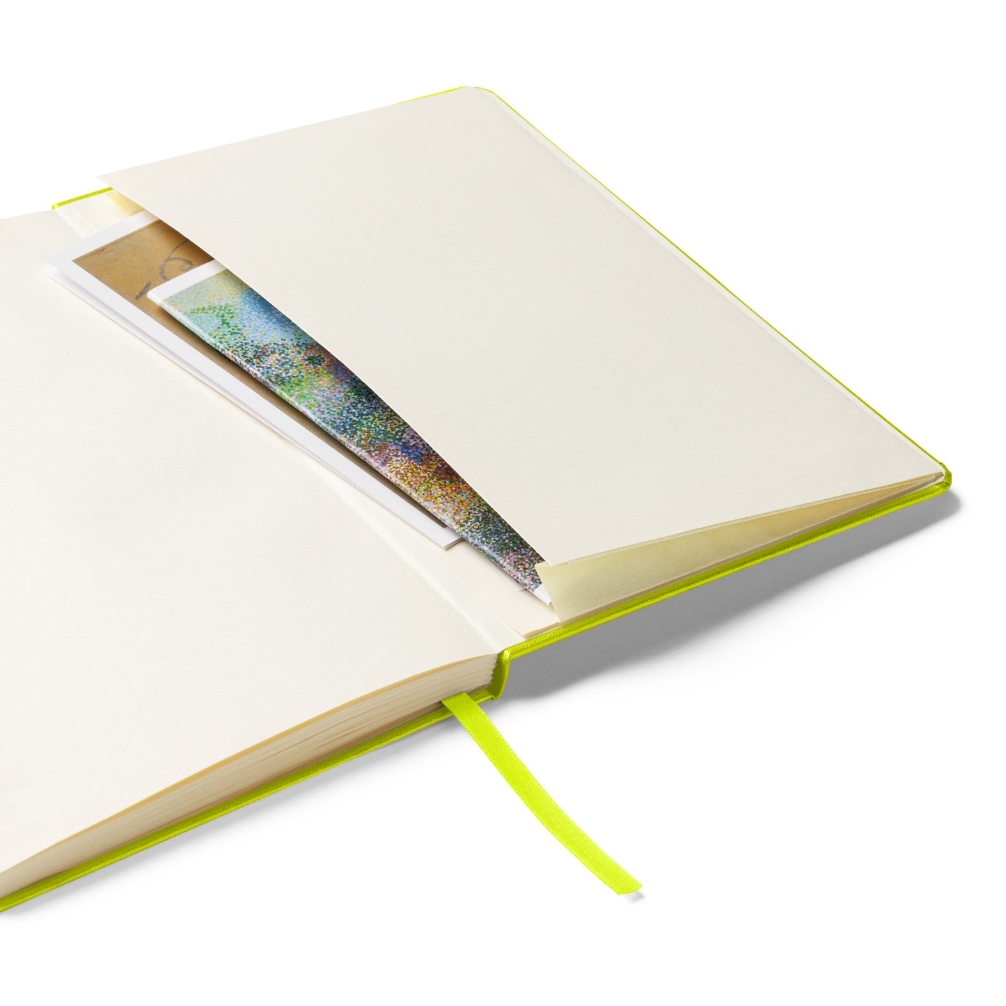 Open notebook with a pocket on the back cover to place notes in - on a white background