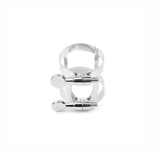 Silver metal ligature on a white background