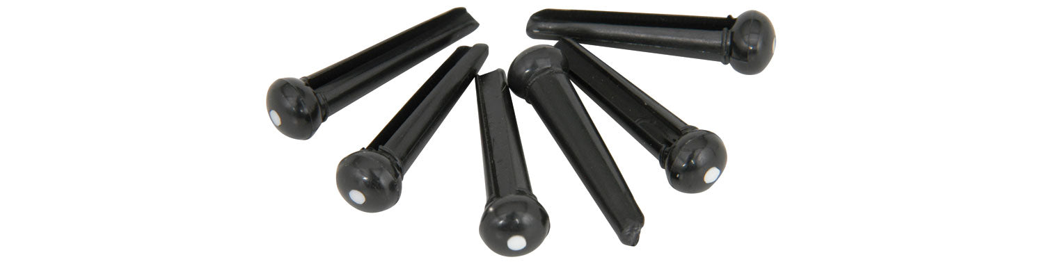 Set of black bridge pin black with a white dot on the heads on a white background