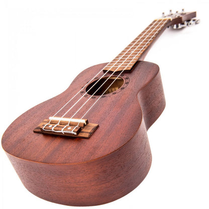 Brown ukulele on a white background