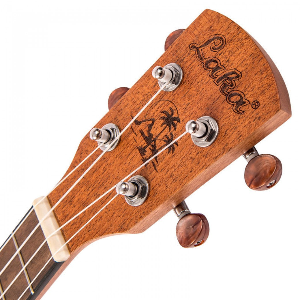 Close-up of a ukulele headstock with 'Laka' branding on a white background
