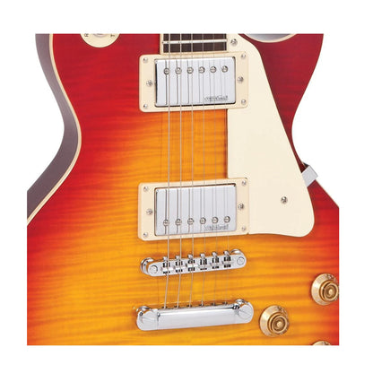 Close-up of a red and orange electric guitar with a white pickguard on a white background