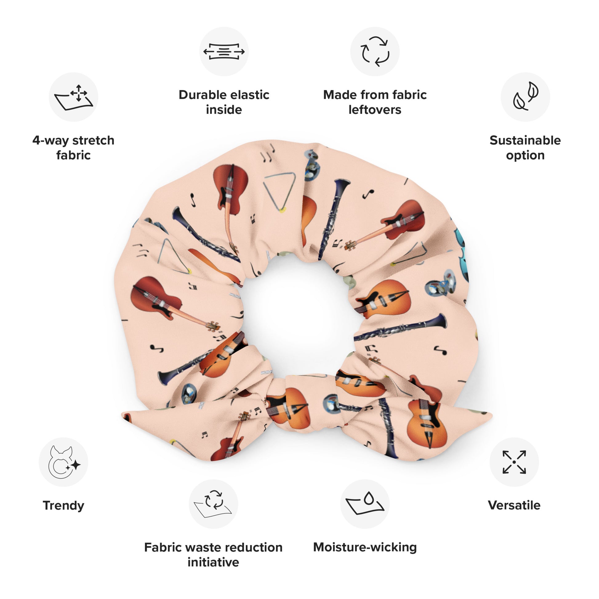 Scarf with musical instrument pattern on a white background with sustainability features listed.