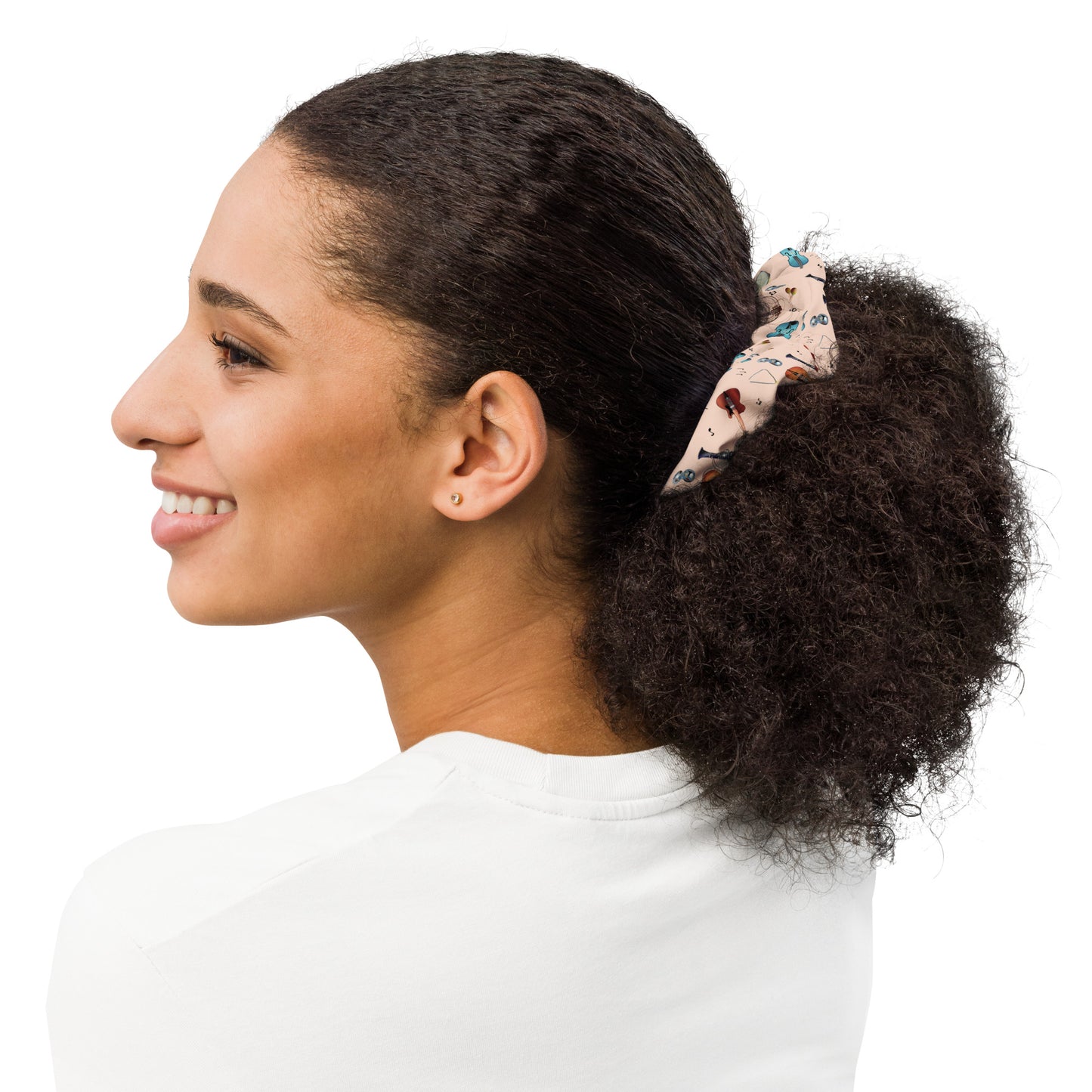 Woman with a ponytail featuring a scrunchie on a white background
